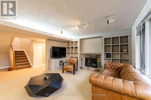 79 Forest Grove Drive, Toronto, ON - Indoor Photo Showing Living Room With Fireplace