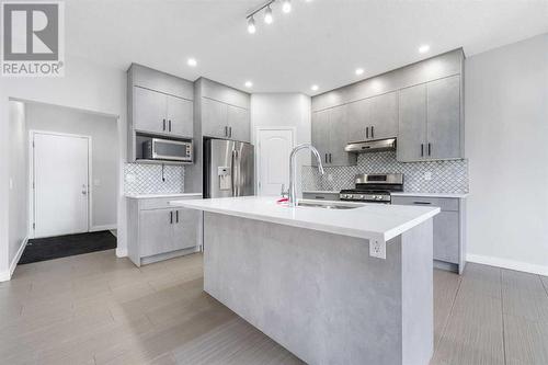 238 Lakeview Inlet, Chestermere, AB - Indoor Photo Showing Kitchen With Upgraded Kitchen