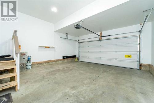 238 Lakeview Inlet, Chestermere, AB - Indoor Photo Showing Garage