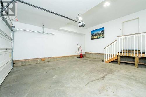 238 Lakeview Inlet, Chestermere, AB - Indoor Photo Showing Garage