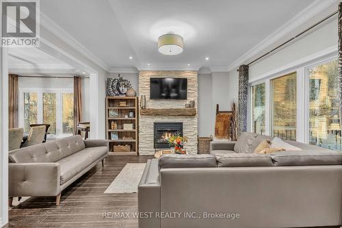 21 Scotia Road, Georgina, ON - Indoor Photo Showing Living Room With Fireplace