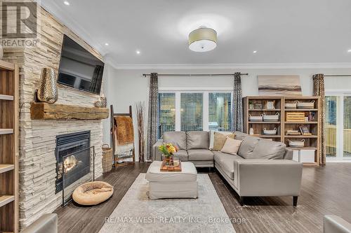 21 Scotia Road, Georgina, ON - Indoor Photo Showing Living Room With Fireplace