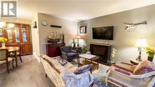 2609 Baseline Road, Ottawa, ON - Indoor Photo Showing Living Room With Fireplace