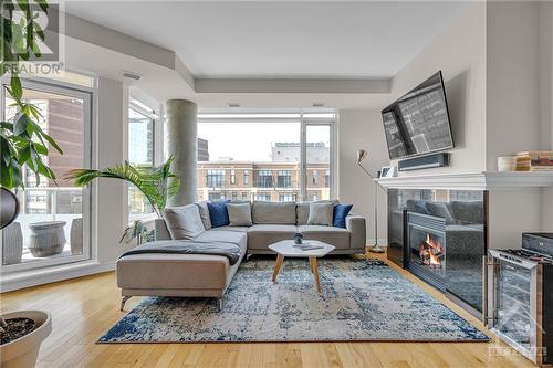 401 Golden Avenue Unit#1003, Ottawa, ON - Indoor Photo Showing Living Room With Fireplace