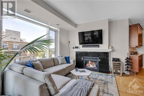 1003 - 401 Golden Avenue, Ottawa, ON - Indoor Photo Showing Living Room With Fireplace