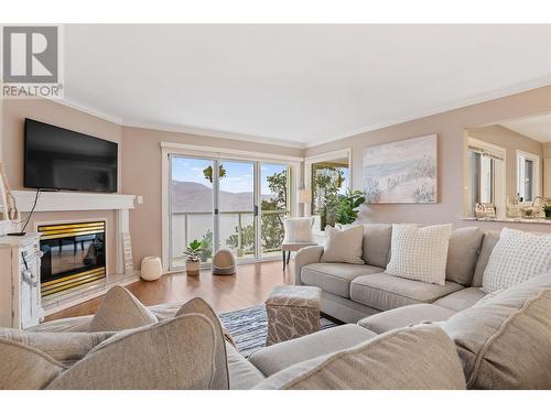 4460 Ponderosa Drive Unit# 105, Peachland, BC - Indoor Photo Showing Living Room With Fireplace