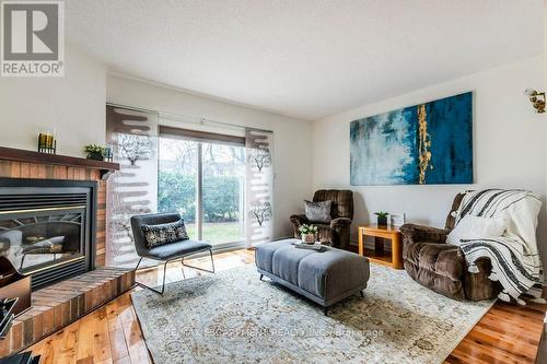 115 - 2205 South Millway, Mississauga, ON - Indoor Photo Showing Living Room With Fireplace