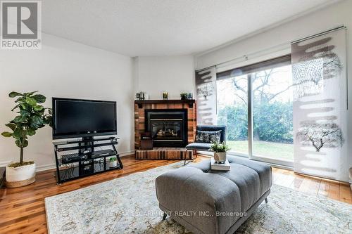 115 - 2205 South Millway, Mississauga, ON - Indoor Photo Showing Living Room With Fireplace