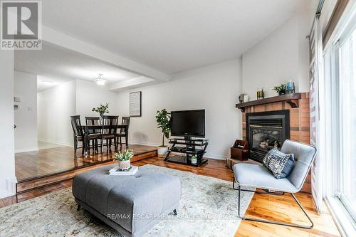 115 - 2205 South Millway, Mississauga, ON - Indoor Photo Showing Living Room With Fireplace