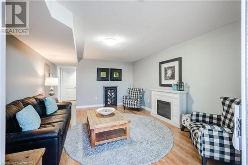 111 King Street E Unit# 9, Ingersoll, ON - Indoor Photo Showing Living Room With Fireplace