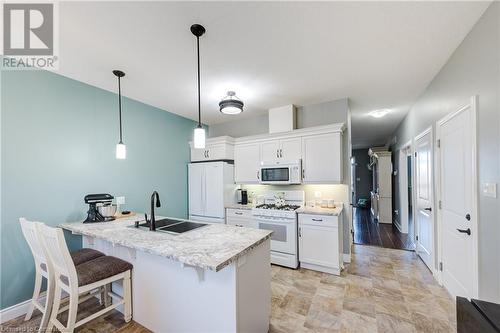 111 King Street E Unit# 9, Ingersoll, ON - Indoor Photo Showing Kitchen With Double Sink