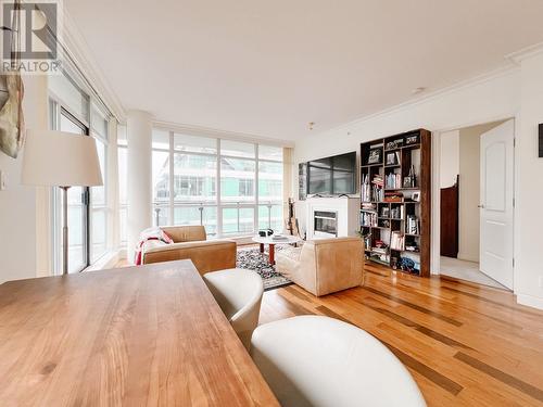 904 162 Victory Ship Way, North Vancouver, BC - Indoor Photo Showing Living Room With Fireplace