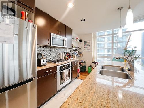 904 162 Victory Ship Way, North Vancouver, BC - Indoor Photo Showing Kitchen With Stainless Steel Kitchen With Double Sink With Upgraded Kitchen