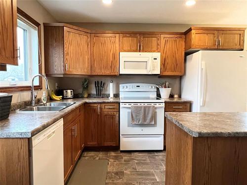 95 Alexander Street, Treherne, MB - Indoor Photo Showing Kitchen With Double Sink