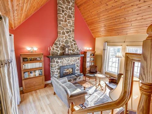 Living room - 2598 4E Rue, Sainte-Sophie, QC - Indoor Photo Showing Living Room With Fireplace