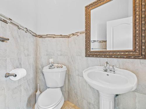 Powder room - 256 Rue Des Alismas, Laval (Sainte-Dorothée), QC - Indoor Photo Showing Bathroom