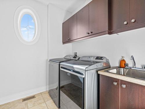 Laundry room - 256 Rue Des Alismas, Laval (Sainte-Dorothée), QC - Indoor Photo Showing Laundry Room