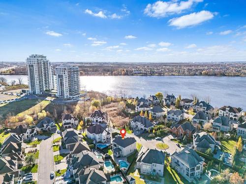 Aerial photo - 256 Rue Des Alismas, Laval (Sainte-Dorothée), QC - Outdoor With Body Of Water With View