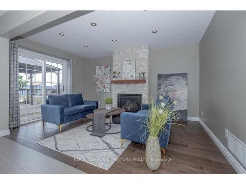 11 Arlston Crt, Whitby, ON - Indoor Photo Showing Living Room With Fireplace