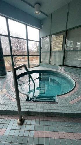 1606-4460 Tucana Crt, Mississauga, ON - Indoor Photo Showing Other Room With In Ground Pool