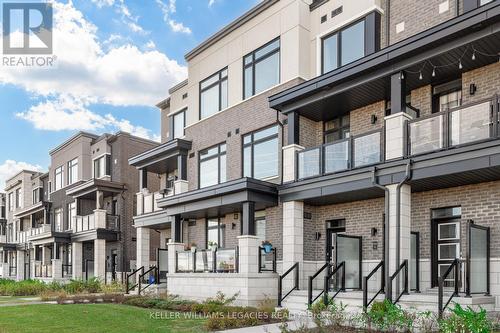 203 - 2550 Castlegate Crossing Drive, Pickering, ON - Outdoor With Balcony With Facade