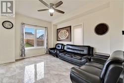 Living room with ceiling fan - 