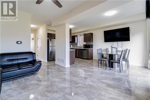 Living room featuring ceiling fan - 40 Todd Crescent, Dundalk, ON - Indoor