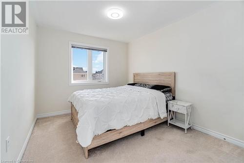 Bedroom featuring light colored carpet - 40 Todd Crescent, Dundalk, ON - Indoor Photo Showing Bedroom