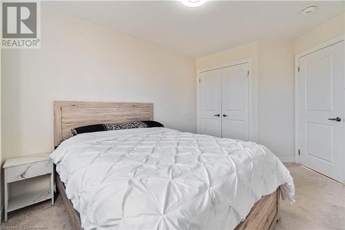 Carpeted bedroom with a closet - 40 Todd Crescent, Dundalk, ON - Indoor Photo Showing Bedroom