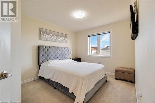 Bedroom featuring light colored carpet - 40 Todd Crescent, Dundalk, ON - Indoor Photo Showing Bedroom