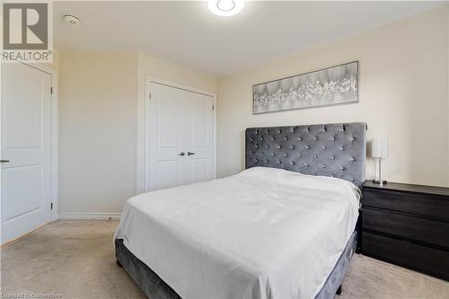 Bedroom featuring light carpet and a closet - 40 Todd Crescent, Dundalk, ON - Indoor Photo Showing Bedroom