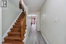 Stairs featuring a textured ceiling and hardwood / wood-style flooring - 42 Donnenwerth Drive, Kitchener, ON  - Indoor Photo Showing Other Room 