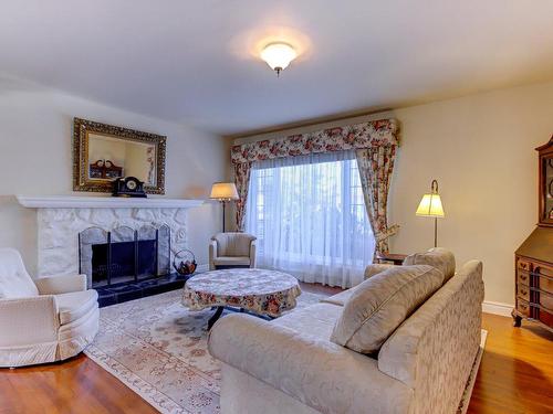 Living room - 1951 Rue De Bedford, Saint-Bruno-De-Montarville, QC - Indoor Photo Showing Living Room With Fireplace