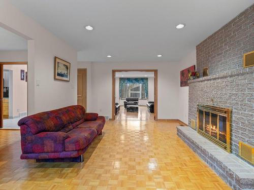 Salle familiale - 1265 Rue Tecumseh, Dollard-Des-Ormeaux, QC - Indoor Photo Showing Living Room With Fireplace