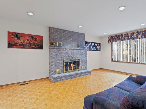 Salle familiale - 1265 Rue Tecumseh, Dollard-Des-Ormeaux, QC - Indoor Photo Showing Living Room With Fireplace