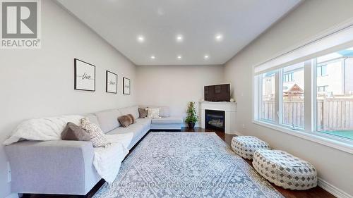 1346 Bardeau Street, Innisfil, ON - Indoor Photo Showing Living Room With Fireplace