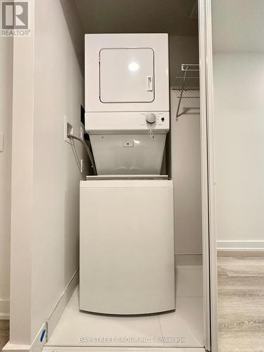 2006 - 238 Simcoe Street, Toronto, ON - Indoor Photo Showing Laundry Room