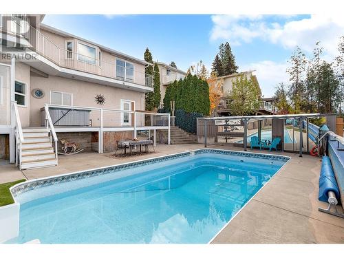 882 Toovey Road, Kelowna, BC - Outdoor With In Ground Pool With Deck Patio Veranda