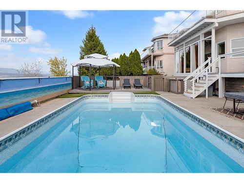 882 Toovey Road, Kelowna, BC - Outdoor With In Ground Pool