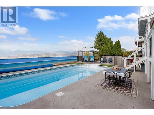 882 Toovey Road, Kelowna, BC - Outdoor With In Ground Pool