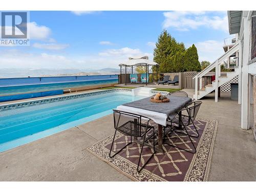 882 Toovey Road, Kelowna, BC - Outdoor With In Ground Pool