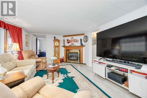 5700 Blackwell Sideroad Unit# 30, Sarnia, ON - Indoor Photo Showing Living Room With Fireplace