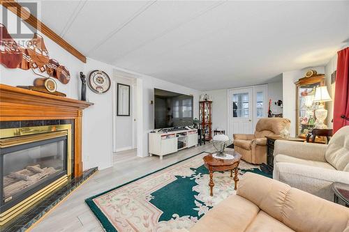 5700 Blackwell Sideroad Unit# 30, Sarnia, ON - Indoor Photo Showing Living Room With Fireplace