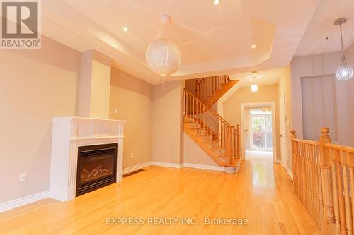 12 Routliffe Lane, Toronto, ON - Indoor With Fireplace