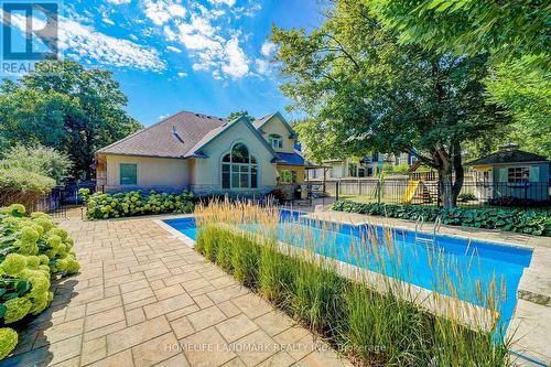 1293 Devon Road, Oakville, ON - Outdoor With In Ground Pool With Deck Patio Veranda