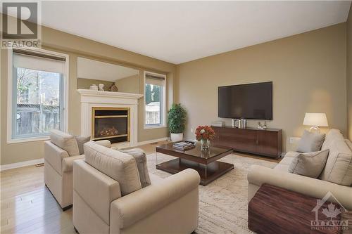 112 Grovemont Drive, Ottawa, ON - Indoor Photo Showing Living Room With Fireplace