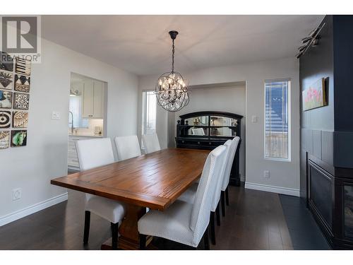 3514 Gordon Drive, Terrace, BC - Indoor Photo Showing Dining Room With Fireplace