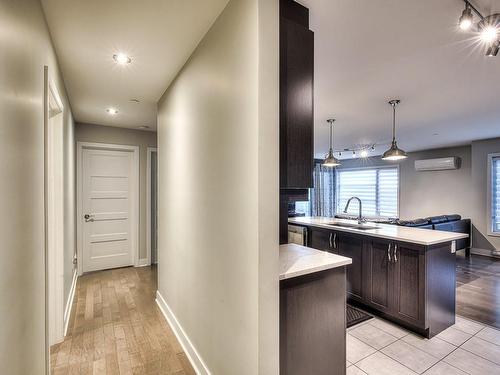 Hall - 304-116 Rue Dubois, Saint-Eustache, QC - Indoor Photo Showing Kitchen