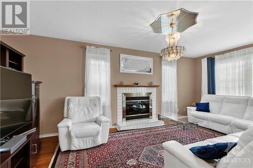 1839 Carrigan Drive, Ottawa, ON - Indoor Photo Showing Living Room With Fireplace