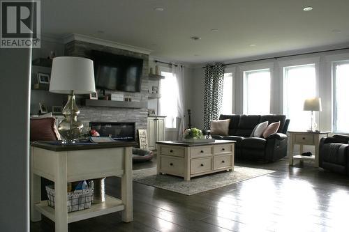 369 A Main Street, Mcivers, NL - Indoor Photo Showing Living Room With Fireplace